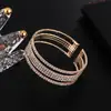 Pulsera de alambre de acero transfronteriza joyería cinco filas llenas de taladro adornos de mano cadena de garra apertura pulsera elástica venta directa de fábrica B298