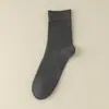 Meias de algodão com costura dupla masculinas outono e inverno novas meias de comprimento médio para a panturrilha algodão masculino negócios meias de algodão atacado