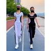 Un conjunto de traje deportivo para correr de secado rápido para mujer 2024 nuevo verano blanco manga corta moda ocio traje deportivo