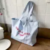 Bolso de Lona con Estampado de Letras para Mujer 2025 Nuevo Bolso Tote de Moda de Verano Estilo Universitario Gran Capacidad Bolso de Hombro Suave