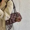 Bolsa de mão de poá de nicho de alta qualidade para mulheres, bolsa bowling versátil com toque de luxo, bolsa de ombro para o dia a dia de grande capacidade para mulheres