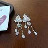 Aretes de borla de flores súper hada diseño nicho temperamento hada suave de alta gama aretes nuevos aretes aretes