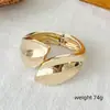 Nuevo Pulsera Popular Europea y Americana de Hoja Exagerada Asimétrica de Aleación Pulsera de Moda Personalizada Pulsera con Hebilla de Resorte Cepillada