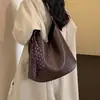 2026 Bolsa Versátil Retro Nova para o Dia a Dia Feminina de Ombro Único Elegante Tecida Grande Capacidade Moda Simples Tote