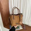 Bolso de hombro de moda transfronterizo para mujer, elegante diseño de bloques de color, bolso tote simple y versátil para el trabajo, retro y casual