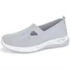Nuevos zapatos casuales cruzados para mujer con superficie de malla fly-knit, zapatos TEMU sin cordones transpirables de suela blanda, talla grande, zapatos de un solo color poco profundos para comercio exterior