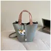 Bolso de hombro y bandolera versátil de moda transfronterizo, bolso de mano con diseño casual de nicho, bolso tipo cubo ligero de gran capacidad