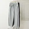 [Especial] Pantalones deportivos casuales de otoño 2026 para mujer talla grande, nuevo diseño de borde inclinado plisado, pierna curva 1011