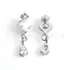 Pendientes de gota de circonita cúbica F136 con tachuelas de circonita, Pendientes de tachuela para lóbulo de la oreja de aleación de titanio G23