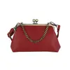 Bolsas: Bolsas de mão retrô em formato de concha europeias e americanas transfronteiriças para mulheres, novas bolsas transversais de moda para o dia a dia 2026, e bolsas tote femininas com fecho de aba