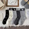 Calcetines de lana y cachemira para mujer, otoño e invierno, bordado lindo de gato de dibujos animados, calcetines de media pantorrilla con lazos, calcetines holgados cálidos y que bloquean la temperatura