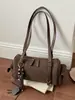 Bolsa de Almohada de Mano Retro Escarchada 2026 Otoño/Invierno Nueva Versátil para Viajar al Trabajo Bolso de Hombro Casual Simple Boston Bag