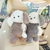 Caja de pañuelos de peluche de dibujos animados para coche, muñeco, soporte colgante para pañuelos en el asiento del coche, diseño creativo de perro pequeño, bolsa colgante para pañuelos de coche