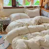 Juego de ropa de cama de cuatro piezas de algodón de doble capa estilo niña, estilo princesa de algodón puro, funda de edredón, sábana, sábana bajera y juego de tres piezas.
