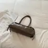 Bolso de hombro minimalista de nicho estilo coreano Shuai Mi Jia para mujer, nuevo modelo de moda otoño 2026, bolso baguette para debajo del brazo