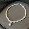Collar de perla de vidrio con microincrustaciones de circonita de cobre con forma de gota de agua, cadena para suéter de otoño e invierno, cadena para clavícula de diseño de nicho de lujo ligero