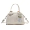 Bolso de mano y bandolera lindo, preppy y versátil de estilo japonés y coreano para niñas, moderno y de alta gama, capacidad pequeña, perfecto para aperitivos y tarjetas