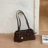 Bolso de axila para mujer de alta gama, lujo ligero, nicho, nuevo modelo de verano 2026, súper popular, exquisito bolso de hombro tipo tote para el día a día