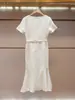 Vestido de Verano Nuevo Estilo Dulce Francés de Manga Corta de Un Solo Botón Cola de Pez de Alta Gama para Mujer en Shenzhen Nanyou
