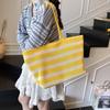 Bolso de mano de alta gama de estilo perezoso, de gran capacidad, para mujer, nuevo, bolso de hombro sencillo con huecos y combinable, bolso de compras moderno.