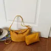 Patrón tejido japonés y coreano simple y elegante 2026 bolso de hombro cruzado de capacidad pequeña para mujer, para el verano, uso diario, madre e hija