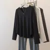 Top casual para mujer de talla grande con dobladillo curvo, corte holgado y relajado, estilo coreano, adelgazante, versátil, simple y con una bonita caída.
