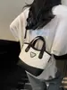 Bolsos populares para mujer de este año 2026 nuevo nicho bordado de diamantes bolso de hombro versátil estilo ins bolso cruzado de hombro