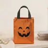 Bolsa tote de Halloween mais vendida internacionalmente, sacola de presente de mão, bolsa com cordão de abóbora para crianças, sacola de doces de Halloween