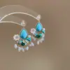 Pendientes de gota con incrustaciones de diamantes transfronterizos europeos y americanos, pendientes de lujo de alta gama, accesorios para orejas de moda de nicho, venta al por mayor desde fabricante de Yiwu