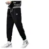 Pantalones de Deportes de Invierno al por Mayor Pana de Peso Pesado Pantalones de Hombre Engrosados con Forro Polar Cálidos para Hombre Casual Versátiles Pantalones de Correr