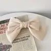 Clip de resorte con lazo de perla, accesorio para el cabello de alta gama, elegante y francés para celebridades de Internet.