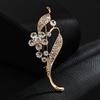 Broche nicho de alta gama lujo ligero traje lazo pedrería ramillete aleación de alta gama accesorios de ropa creativos venta al por mayor