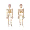Brincos da Série de Halloween Design de Nicho Novo Europeu e Americano Brilhantes Full Diamond Crânio Móvel Brincos para Mulheres