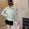 Cárdigan de punto con cuello de muñeca acanalado de estilo dulce para mujer, nuevo top reductor de edad de manga larga para otoño e invierno, chaqueta suéter básica