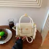 Bolso de mano cuadrado pequeño retro de moda transfronterizo 2026 verano nuevo bolso de hombro casual bolso cruzado elegante