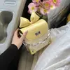 Bolsa Mini de Batom com Laço Moda Primavera e Verão para Mulheres, Nova 2026 Bolsa Transversal de Alto Padrão, Bolsa Pequena Versátil com Corrente
