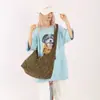 Bolso de mano retro fresco con estampado de leopardo de alta gama para mujer, mochila simple y ligera de gran capacidad para compras y viajes
