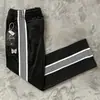 Pantalones para hombre Needles, marca de moda europea y americana de nicho, bordado de mariposa, a rayas, pierna ancha holgada, pantalones rectos casuales deportivos