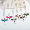 El más vendido en Europa y América, colgante de metal resistente de estilo vintage con diseño de pequeño dragón de dibujos animados que gotea aceite y diamantes, collar de pareja de animales