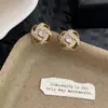 Brincos Elegantes Estilo Chanel de Zircônia Trevo de Quatro Folhas 2026 Novo Estilo Minimalista Cool Design Personalizado Brincos para Mulheres