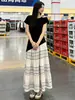Traje de Mujer de Moda 2026 Nuevo Estilo Gama Alta Elegante Conjunto de Atuendo de Verano con Top Negro y Falda Blanca