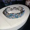 Pendientes, Anillos, Pulseras de Flor Ovalada Hueca de Zircón de Lujo Transfronterizos y Joyería de Lujo de Alto Nivel para Banquetes