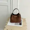 Bolso tipo cubo más vendido transfronterizo, acabado mate retro, bolso de hombro versátil para mujer, venta al por mayor para exportación, bolso cruzado, bolso para el trabajo