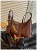 Bolsa de Axila Grande Capacidade Feminina Outono 2026 Nova Casual Retro Nicho Versátil Trabalho Deslocamento Moda Bolsa de Ombro Único