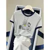 Camiseta de algodón para mujer de manga corta con diseño de hombros en contraste, única y elegante, ligera, nuevo modelo de verano 2026