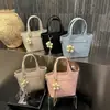 Bolso Cubo Tote de Gran Capacidad Transfronterizo para Mujer 2026 Primavera Nuevo de Moda Versátil con Patrón Granulado Bolso de Hombro Cruzado