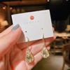 Corea del Sur otoño e invierno aretes largos de ópalo tipo tulipán Dongdaemun aretes súper de hada moda aretes Joker al por mayor