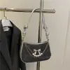 2025 Nuevo Bolso Caliente de Mezclilla con Lazo para Axila Retro Nicho Americano Bandolera Cadena Bolso de Hombro para Mujer