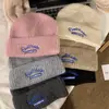 Gorro para mujer 2023, nuevo estilo, cálido gorro de lana, estilo coreano, versátil, para otoño e invierno, con protección para las orejas, puntera de punto que hace que el rostro parezca pequeño.