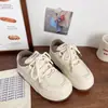 Zapatos blancos pequeños de suela gruesa color blanco leche para mujer muffin 2025 primavera y verano nuevos chic nicho feos lindos zapatos pan con punta redonda zapatos de plataforma